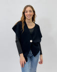 Maglia asimmetrica con bottone