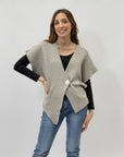 Maglia asimmetrica con bottone