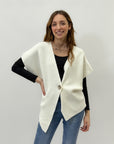 Maglia asimmetrica con bottone