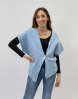Maglia asimmetrica con bottone