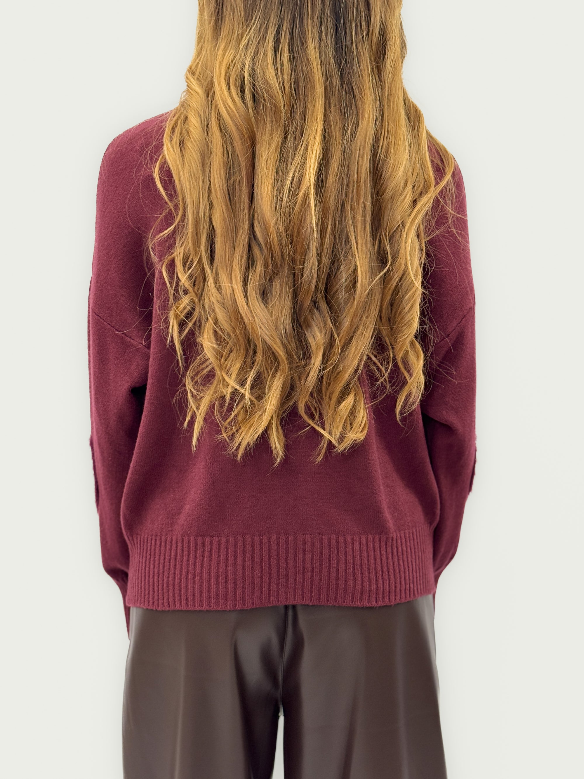 Maglione con cuori in rilievo – Morbidezza e romanticismo