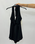 Tuta corta con scollo halter