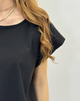 Maglia con bottoni laterali