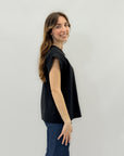 Maglia con bottoni laterali