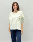 Maglia con manica a righe