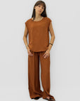 Completo top sfrangiato e pantalone palazzo