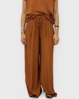 Completo top sfrangiato e pantalone palazzo