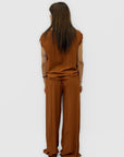 Completo top sfrangiato e pantalone palazzo