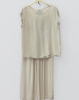 Completo top sfrangiato e pantalone palazzo