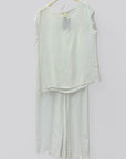 Completo top sfrangiato e pantalone palazzo