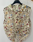 Camicia smanicata fantasia floreale con nodo