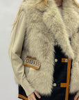 Gilet effetto pelliccia con dettagli ricamati