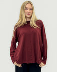 Maglione morbido basic con intreccio