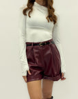 Shorts in ecopelle con cintura