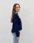 Maglia con scritto "flower"