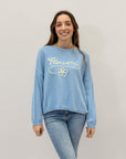 Maglia con scritto "flower"