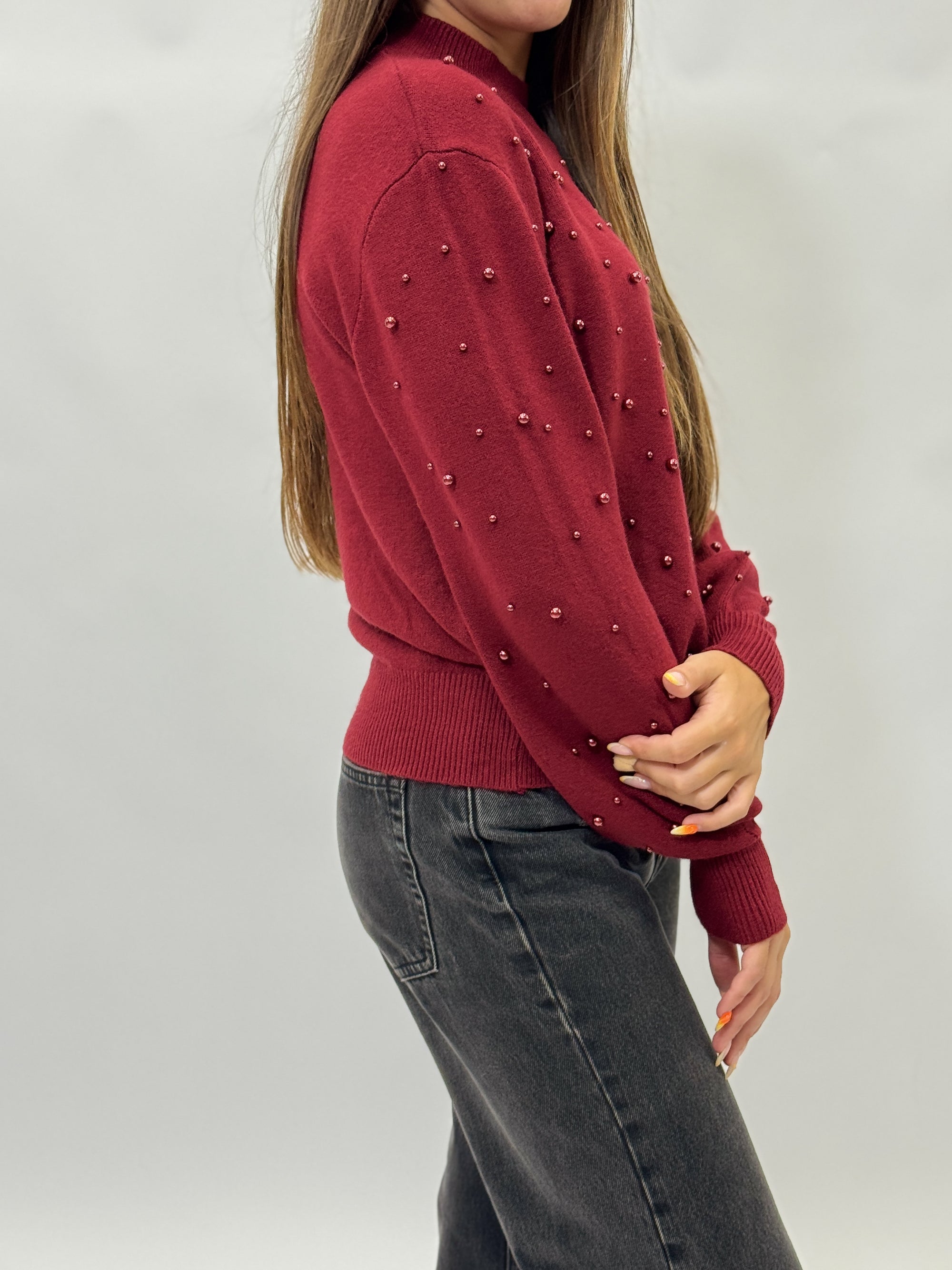 Maglione con perle applicate