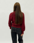 Maglione con perle applicate
