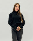 Maglione con perle applicate