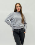 Maglione con perle applicate