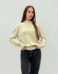 Maglione con perle applicate