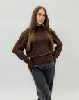 Maglione con perle applicate