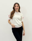 Maglia con fiocchi