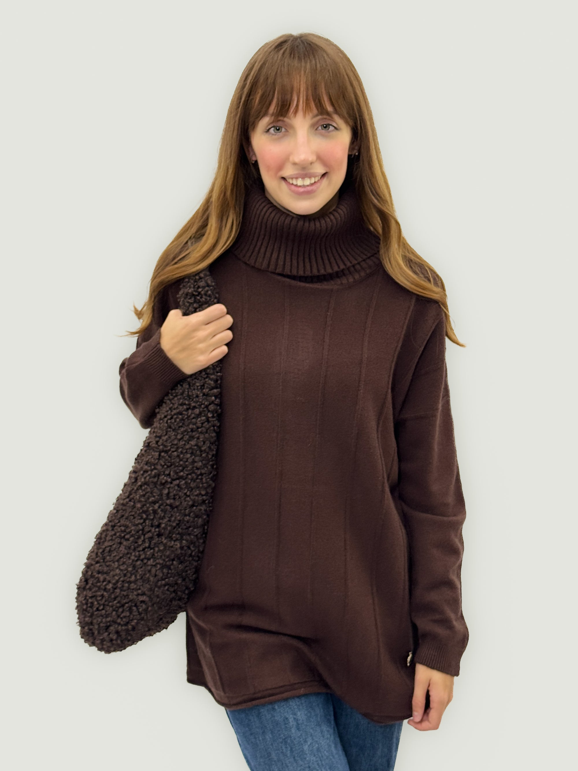 Borsa in pelliccia effetto teddy con manico in pelle – Made in italy