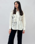 Camicia con strass e scritta