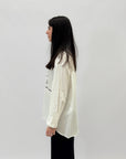 Camicia con strass e scritta