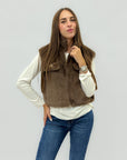 Gilet donna in ecopelliccia con bottoni gioiello