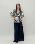 Completo maglia con fiori e pantalone taglia comoda