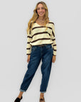 Jeans donna balloon fit con cintura borchiata