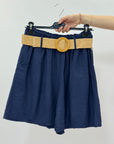 Pantaloncini con cintura in paglia