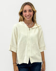 Cardigan donna con cappuccio, zip e fondo asimmetrico