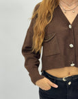 Cardigan corto con bottoni gioiello