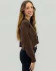 Cardigan corto con bottoni gioiello
