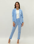 Pantaloni a sigaretta con svolta