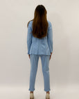 Pantaloni a sigaretta con svolta