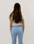 Pantaloni a sigaretta con svolta