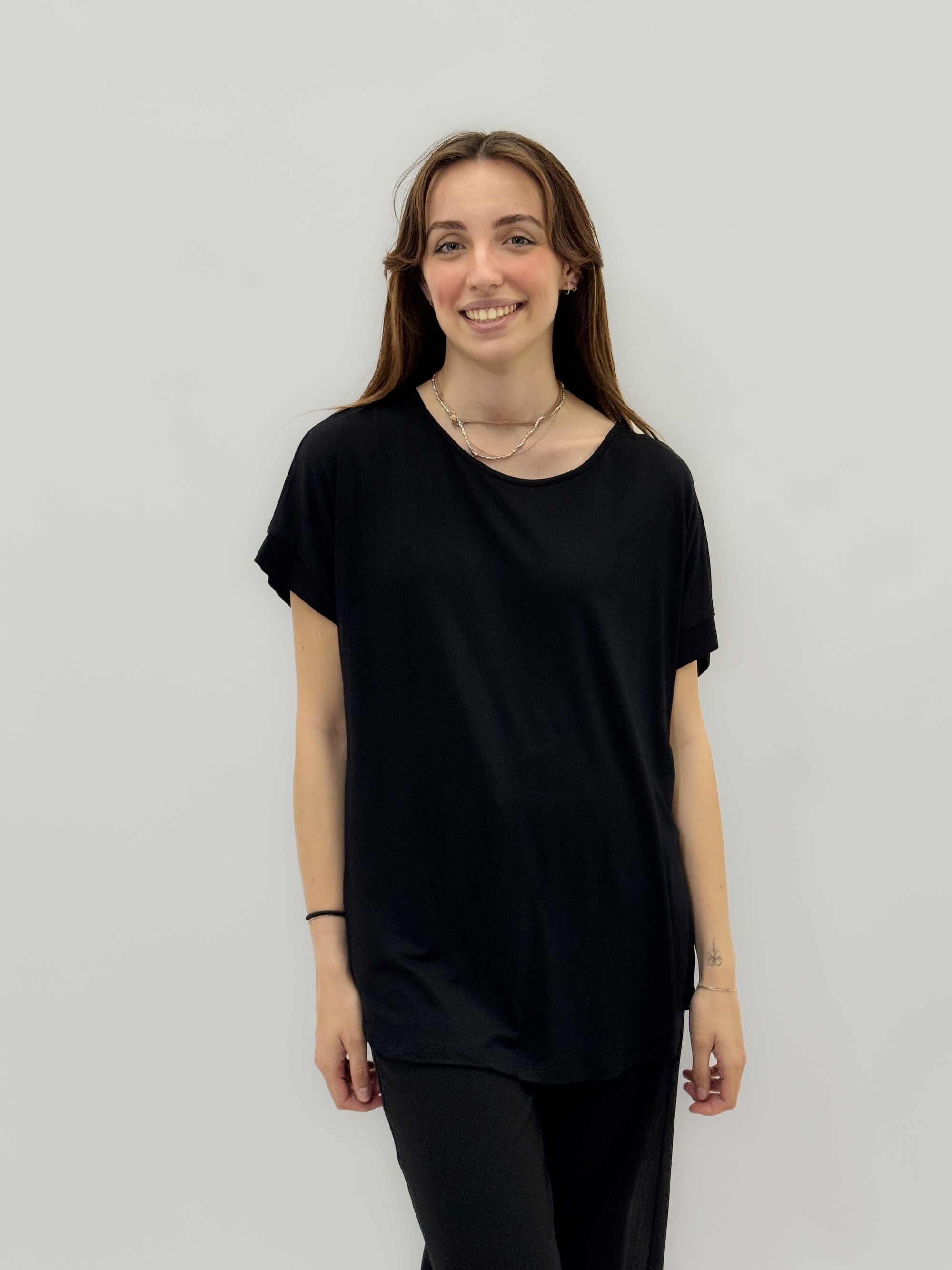 Maglia a tinta unita con fiocco dietro