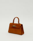 Mini bag a mano in vera pelle scamosciata con chiusura gioiello