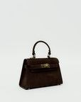 Mini bag a mano in vera pelle scamosciata con chiusura gioiello