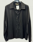 Camicia fluida con colletto e abbottonatura frontale