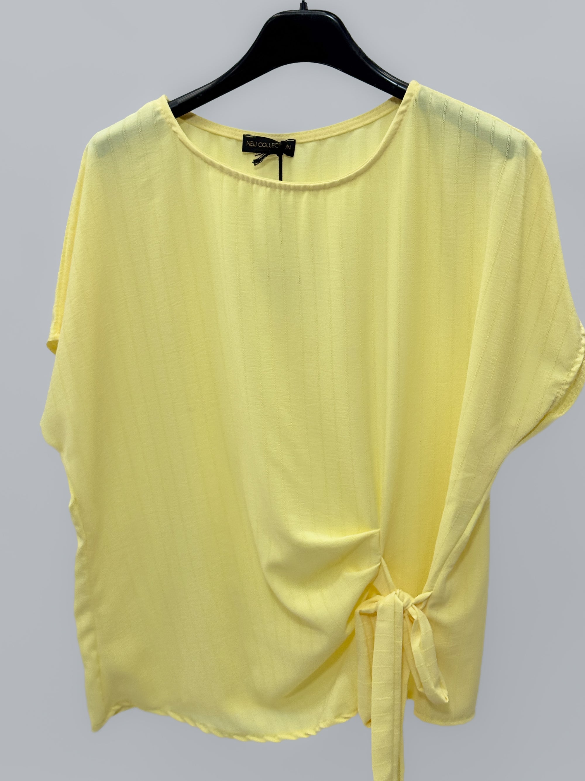 Blusa a righe con nodo laterale