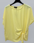 Blusa a righe con nodo laterale
