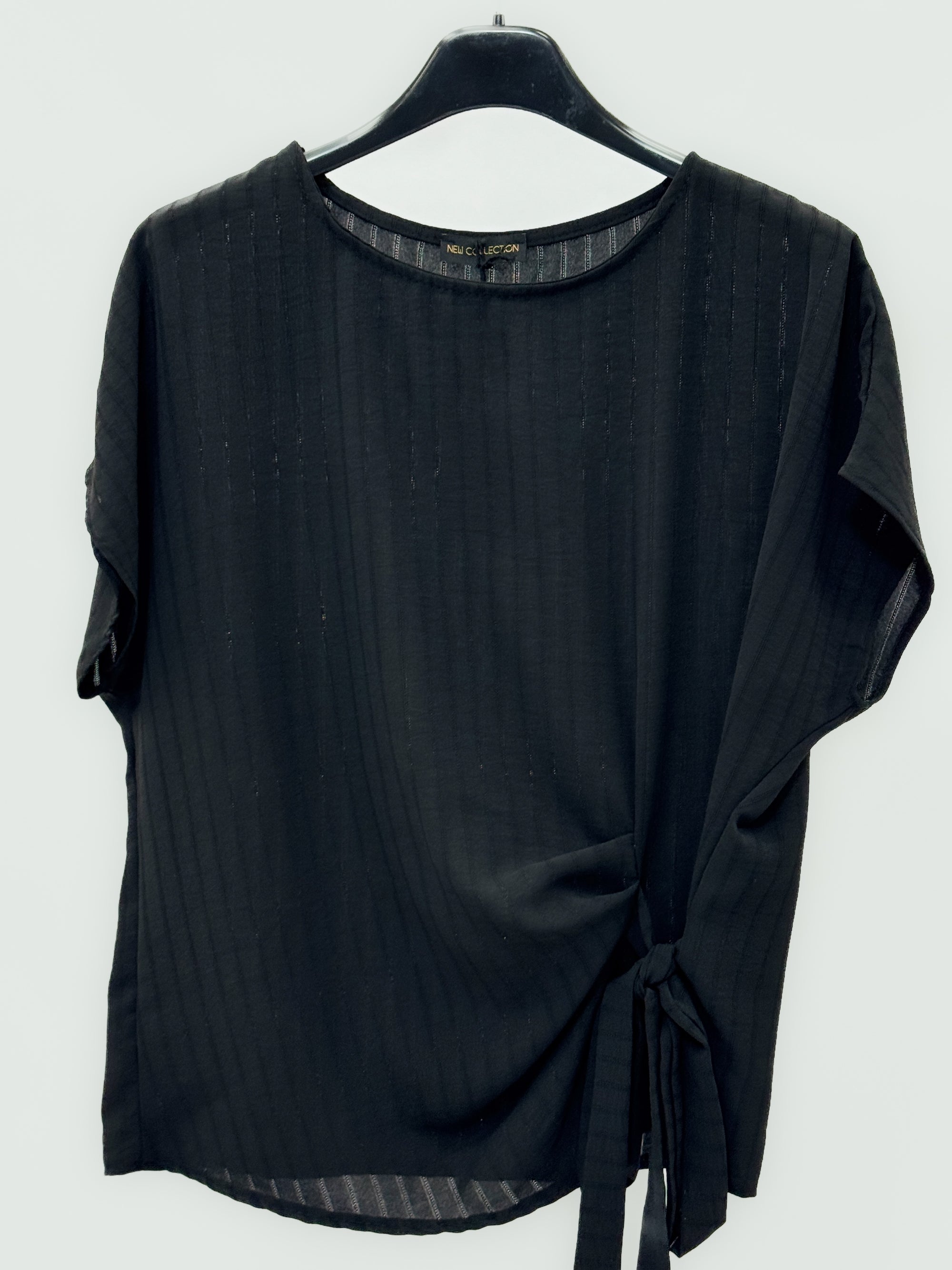 Blusa a righe con nodo laterale