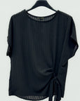 Blusa a righe con nodo laterale