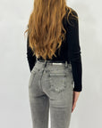 Jeans donna grigi a zampa – Vita media, effetto slavato