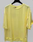 T-shirt con fondo in pizzo e vestibilità morbida